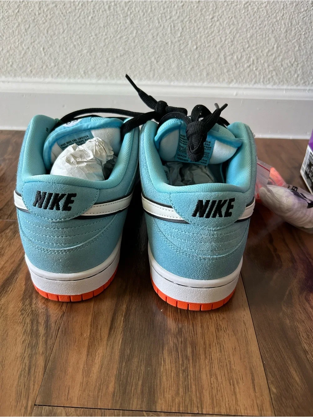 Nike Dunk Low Light Blue with White Swoosh and Orange Outsole